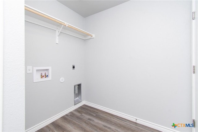 laundry area featuring laundry area, baseboards, wood finished floors, hookup for an electric dryer, and washer hookup