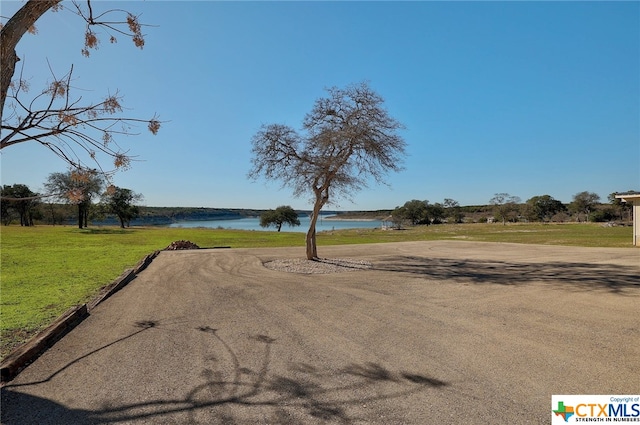 view of street featuring a water view