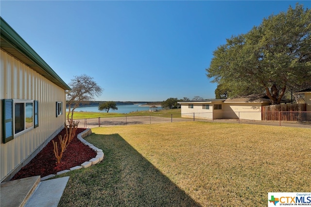 view of yard featuring a water view