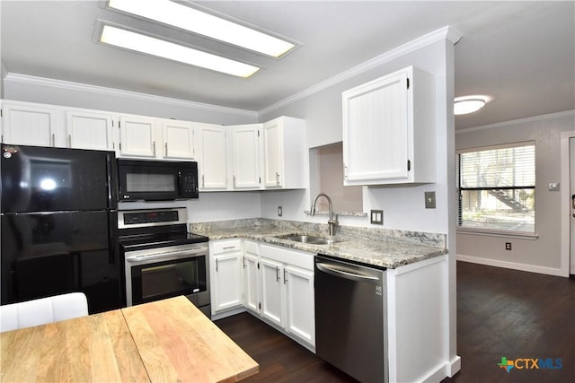 1624 Aquarena Springs Dr Unit G155, San Marcos, TX 78666 - kitchen featuring black appliances, ornamental molding, white cabinetry, dark wood finished floors, and light stone counters
