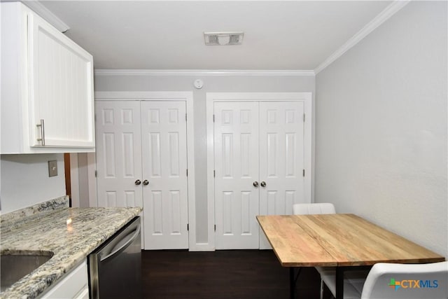 1624 Aquarena Springs Dr Unit G155, San Marcos, TX 78666 - dining room with ornamental molding and dark wood-style flooring