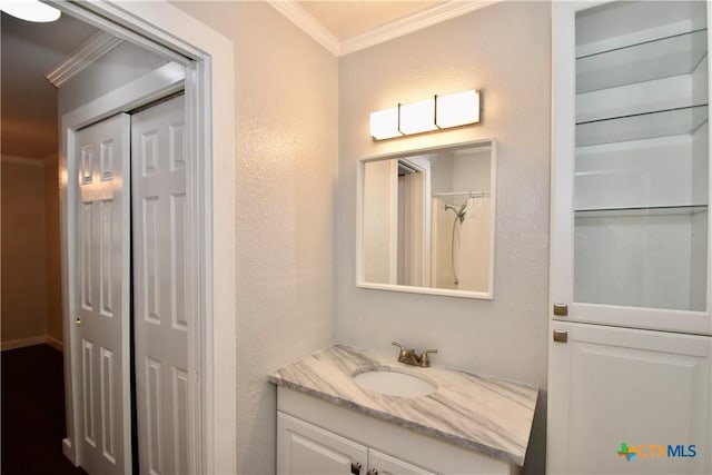 1624 Aquarena Springs Dr Unit G155, San Marcos, TX 78666 - bathroom with crown molding, vanity, and a textured wall