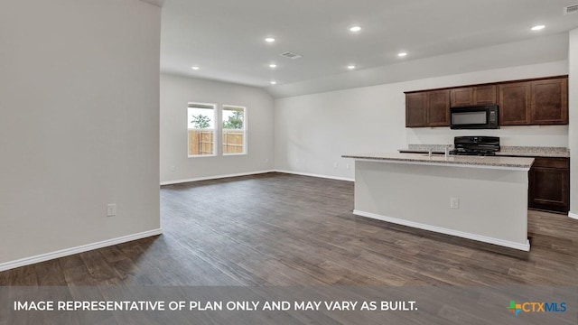 kitchen with an island with sink, vaulted ceiling, dark wood-type flooring, and black appliances