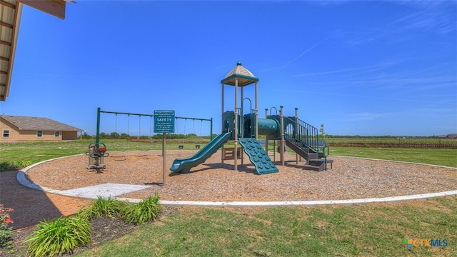 view of playground featuring a lawn