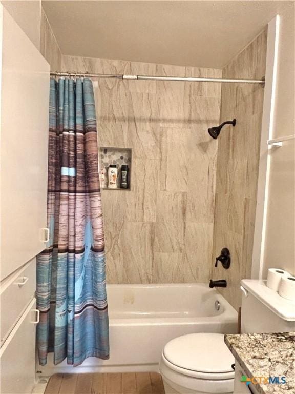 full bathroom featuring vanity, toilet, and shower / bath combo