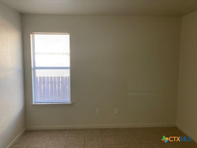 view of tiled empty room