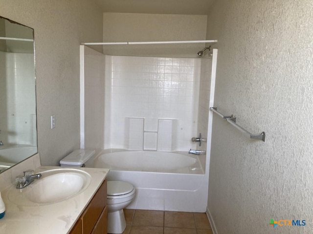 full bathroom with tile patterned floors, vanity, toilet, and shower / bathing tub combination