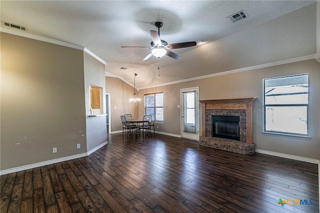 unfurnished living room featuring wood-type flooring, visible vents, and vaulted ceiling