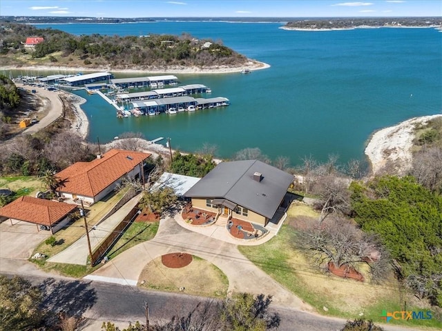 drone / aerial view with a water view