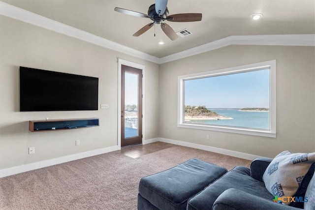 living room featuring lofted ceiling, a water view, ornamental molding, ceiling fan, and carpet