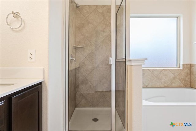 1328 Blue Leaf Dr, Temple, TX 76502 - full bathroom featuring a shower stall, a bath, and vanity