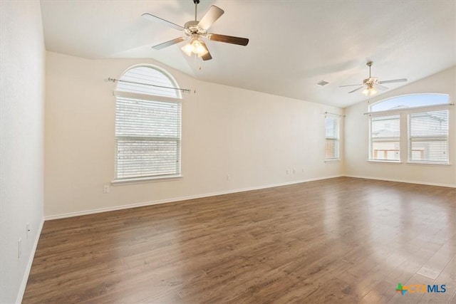 1328 Blue Leaf Dr, Temple, TX 76502 - spare room featuring a ceiling fan, wood finished floors, vaulted ceiling, and a wealth of natural light