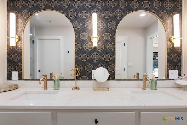 9 Mission Trce, New Braunfels, TX 78130 - bathroom featuring double vanity and recessed lighting