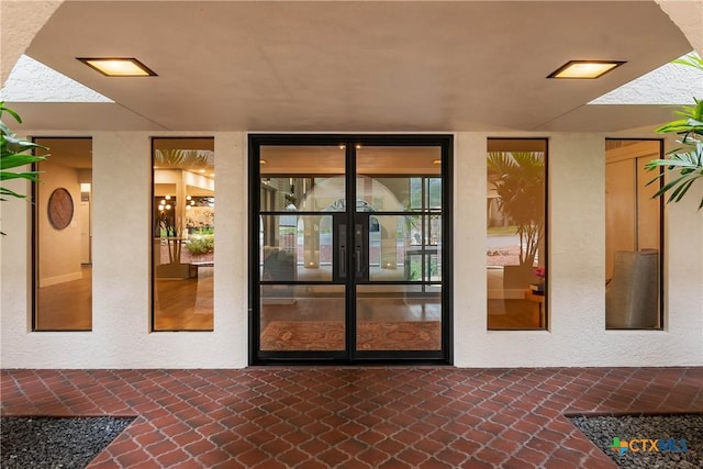 9 Mission Trce, New Braunfels, TX 78130 - property entrance featuring french doors and stucco siding