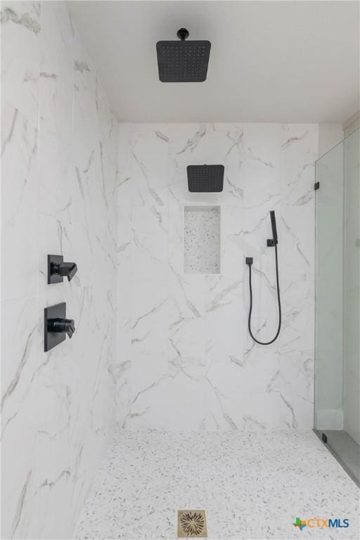9 Mission Trce, New Braunfels, TX 78130 - full bathroom featuring a marble finish shower