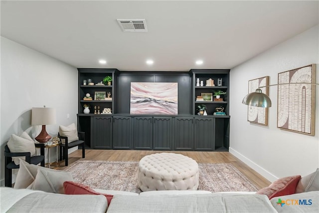 9 Mission Trce, New Braunfels, TX 78130 - living area featuring light wood-style floors and recessed lighting