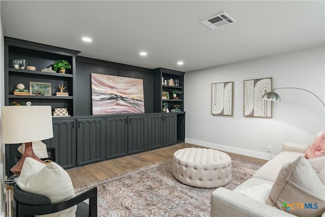 9 Mission Trce, New Braunfels, TX 78130 - living area featuring light wood-style flooring, recessed lighting, and built in features