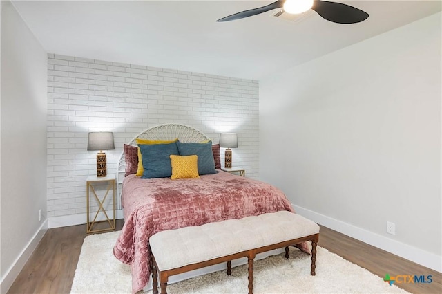 9 Mission Trce, New Braunfels, TX 78130 - bedroom featuring wood finished floors and a ceiling fan