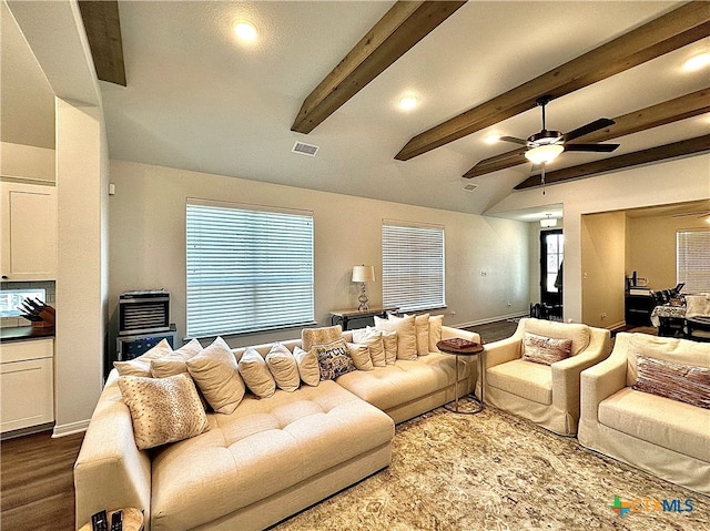 living room featuring lofted ceiling with beams, wood-type flooring, and ceiling fan