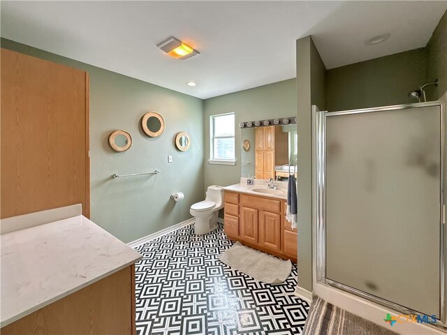 149 Gallagher Dr, Canyon Lake, TX 78133 - full bath featuring a stall shower, vanity, and tile patterned floors