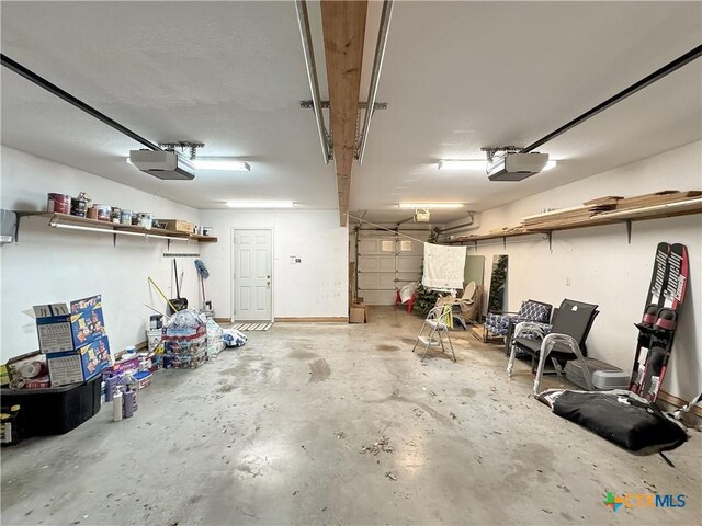 149 Gallagher Dr, Canyon Lake, TX 78133 - garage with a garage door opener