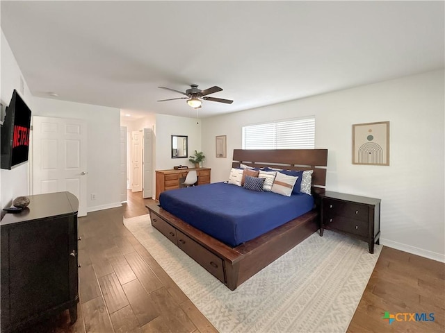 149 Gallagher Dr, Canyon Lake, TX 78133 - bedroom with wood finished floors and a ceiling fan