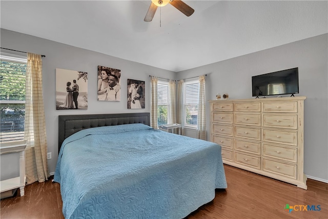 bedroom featuring wood-type flooring and ceiling fan