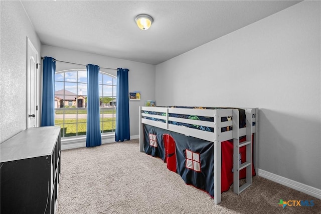 10103 Taylor Renee Dr, Killeen, TX 76542 - carpeted bedroom with a textured ceiling