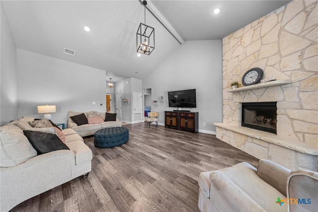 10103 Taylor Renee Dr, Killeen, TX 76542 - living area featuring wood finished floors, a fireplace, and high vaulted ceiling