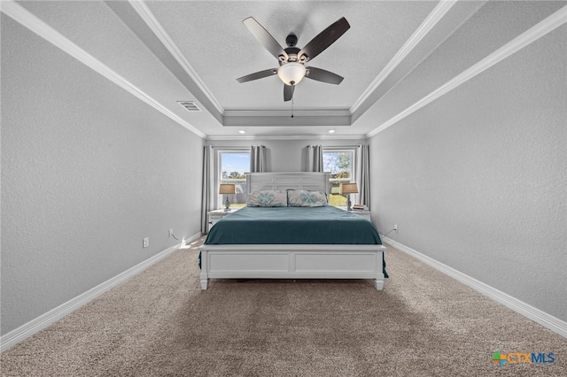 10103 Taylor Renee Dr, Killeen, TX 76542 - carpeted bedroom with a tray ceiling, ornamental molding, a textured wall, and ceiling fan