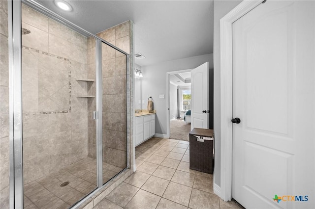 10103 Taylor Renee Dr, Killeen, TX 76542 - bathroom featuring a shower stall, vanity, tile patterned flooring, and recessed lighting