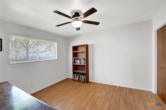 1802 Chestnut St, Floresville, TX 78114 - interior space with wood finished floors and a ceiling fan