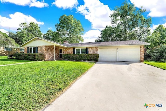 1802 Chestnut St, Floresville, TX 78114 - ranch-style home featuring brick siding, concrete driveway, a garage, and a front yard