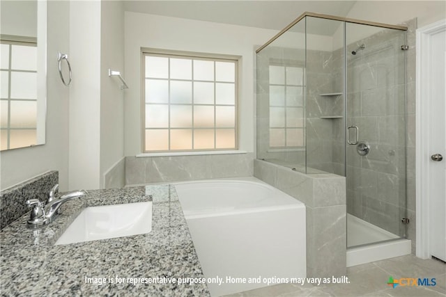 bathroom with sink, tile patterned flooring, plenty of natural light, and shower with separate bathtub