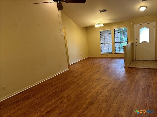 interior space featuring wood-type flooring, ceiling fan, and lofted ceiling