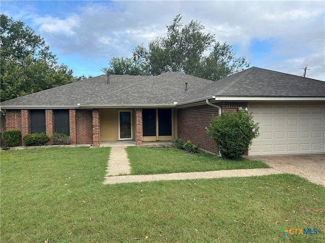 single story home with a front lawn and a garage