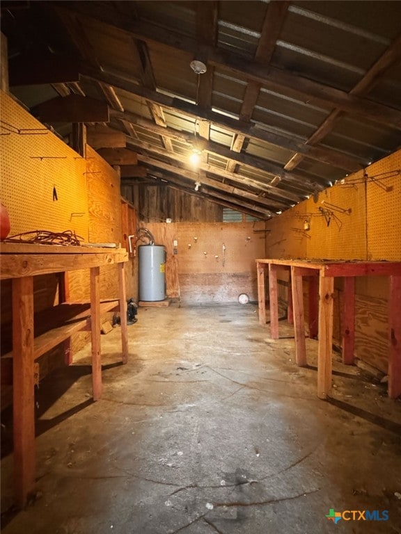 548 County Road 303, Shiner, TX 77984 - below grade area with a workshop area and water heater