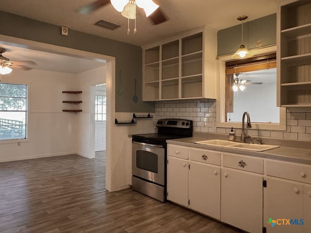 548 County Road 303, Shiner, TX 77984 - kitchen featuring open shelves, a ceiling fan, and electric range