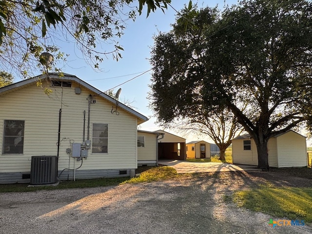 548 County Road 303, Shiner, TX 77984 - view of home's exterior featuring crawl space and driveway