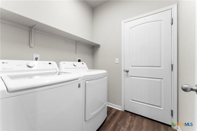7628 Copper Creek Trl, Temple, TX 76502 - laundry area featuring washer and dryer, dark wood-type flooring, and baseboards