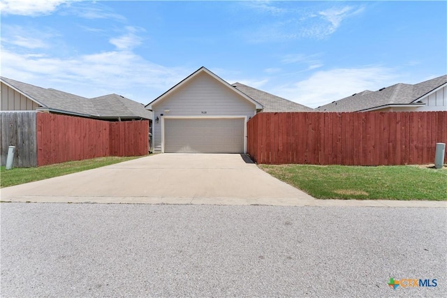 7628 Copper Creek Trl, Temple, TX 76502 - view of front of home featuring concrete driveway, fence, and a garage