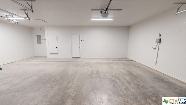 808 Dred Roger Cir, Killeen, TX 76542 - garage featuring a garage door opener and electric panel