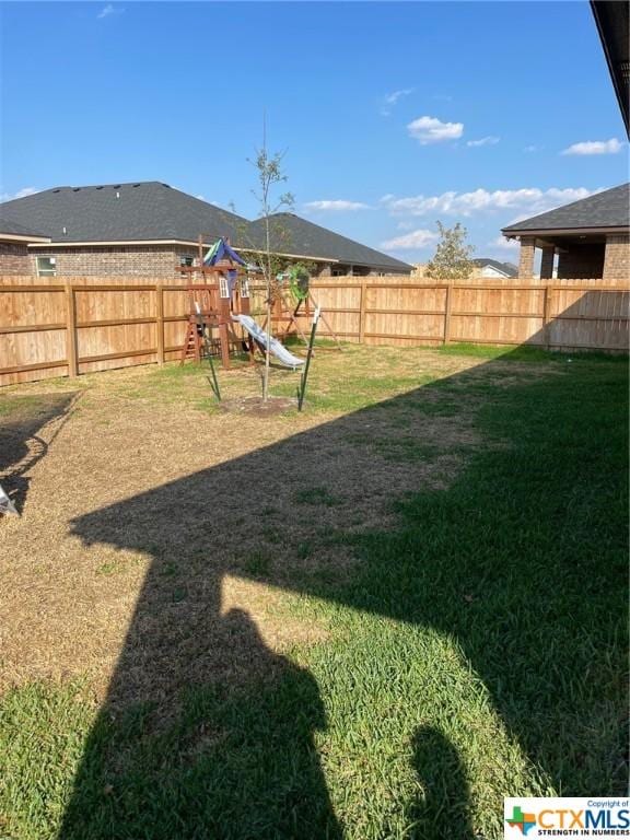 view of yard featuring a playground