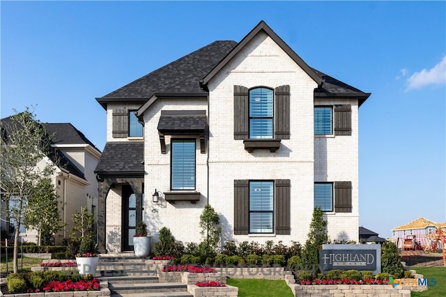 1810 Nettletree Rd, New Braunfels, TX 78132 - french country inspired facade featuring brick siding and a shingled roof