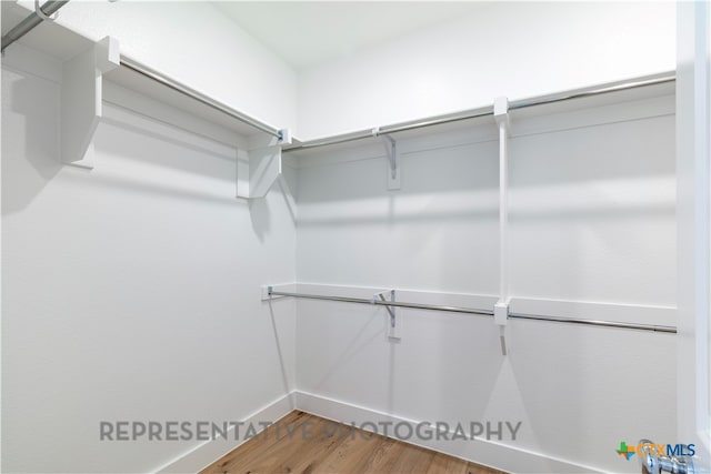 1810 Nettletree Rd, New Braunfels, TX 78132 - spacious closet with wood finished floors