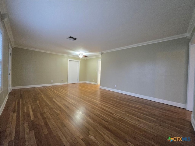 unfurnished room featuring crown molding, ceiling fan, and dark hardwood / wood-style flooring