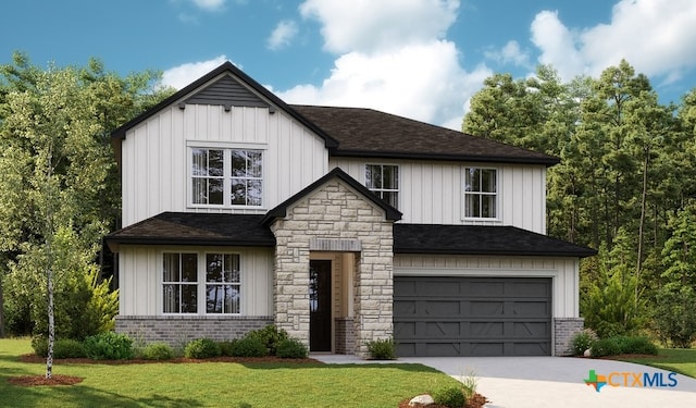 view of front of property with a garage and a front yard