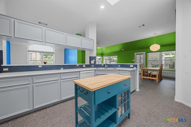 9100 Brimstone Ln, Austin, TX 78717 - kitchen with butcher block countertops, dishwasher, a sink, healthy amount of natural light, and recessed lighting