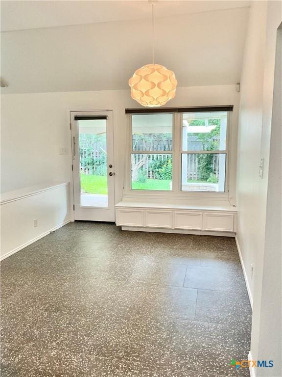 9100 Brimstone Ln, Austin, TX 78717 - unfurnished dining area featuring healthy amount of natural light, vaulted ceiling, and light speckled floor