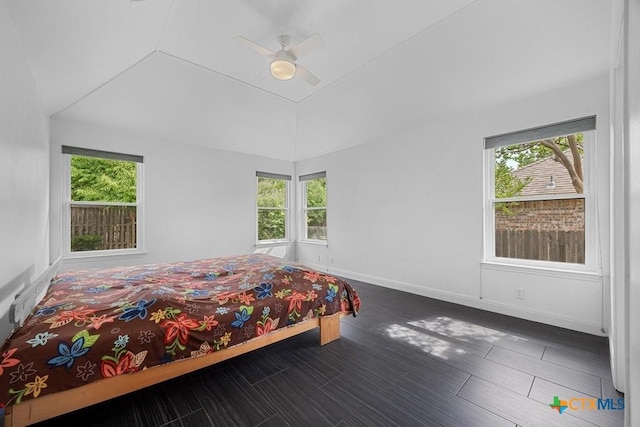 9100 Brimstone Ln, Austin, TX 78717 - bedroom featuring ceiling fan, vaulted ceiling, and baseboards